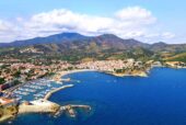 stock-photo-aerial-view-of-the-city-of-banyuls-sur-mer-between-mediterranean-sea-and-massif-des-alb-res-on-2019273026_2-1